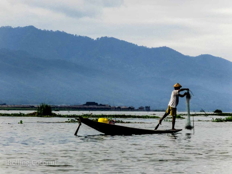 Myanmar Itinerary Inle Lake Fisherman With Net Rolling Coconut Ooaworld Photo Ooaworld