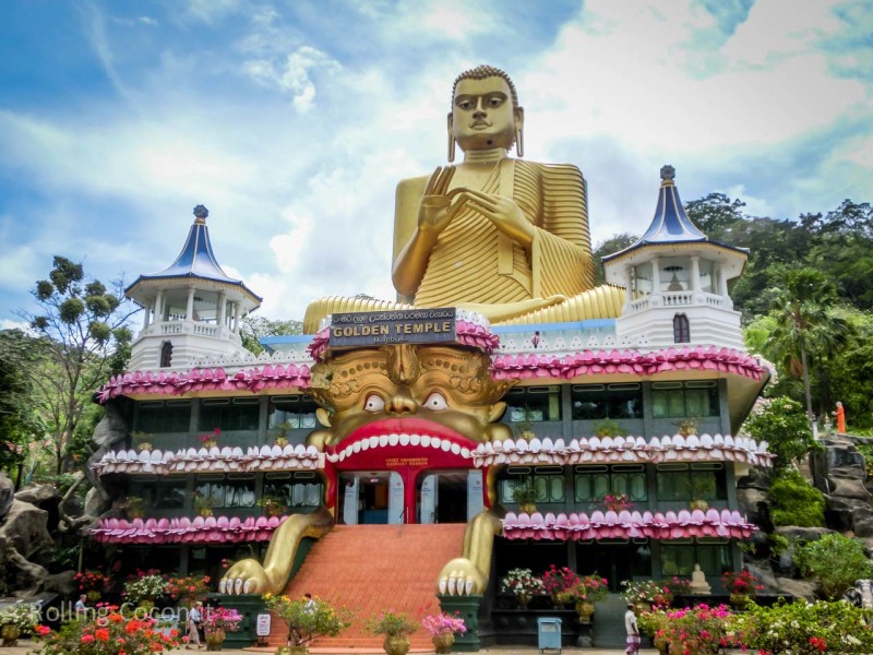Dambulla Sri Lanka Itinerary Golden Temple Entrance ooaworld Rolling Coconut Photo Ooaworld