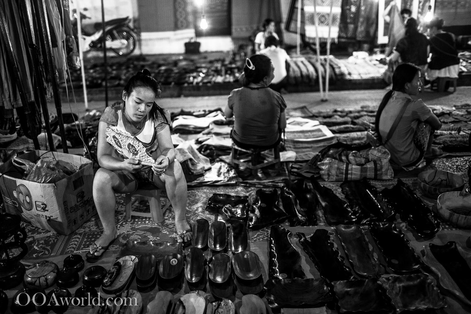 Girl Selling Shoes at the Luang Prabang Market Photo Ooaworld