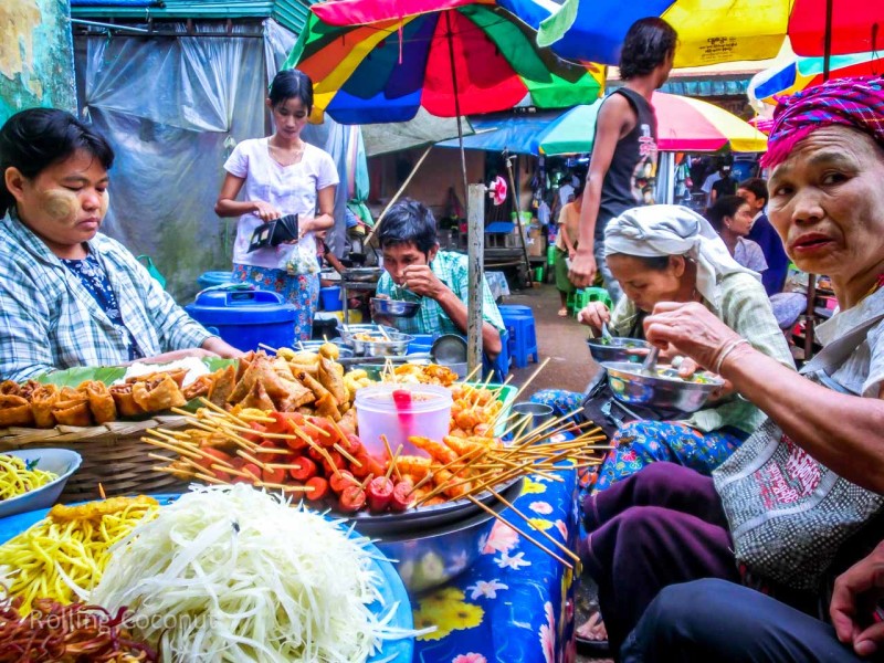Breakfast with the locals in Hpa An market Myanmar ooaworld Rolling Coconut Photo Ooaworld