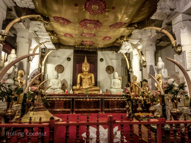 Kandy Temple of the Tooth Buddha Statue Sri Lanka ooaworld Rolling Coconut Photo Ooaworld