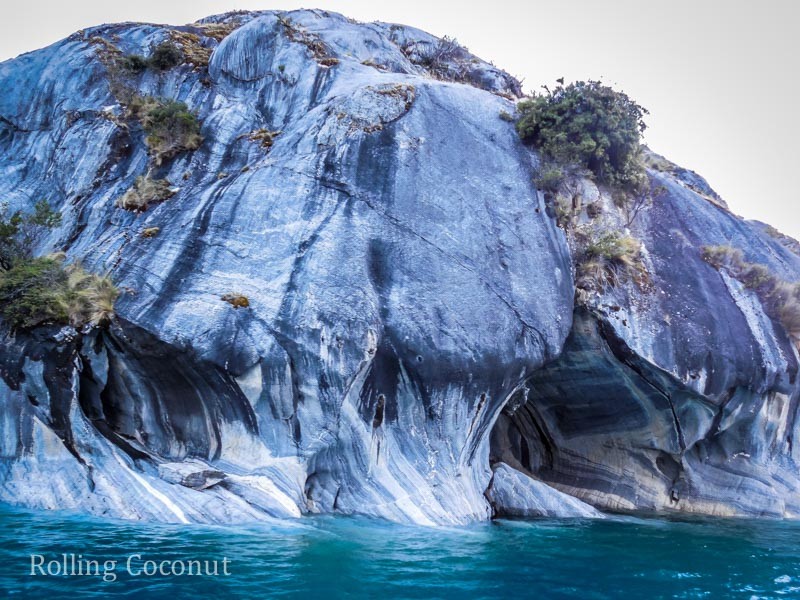Puerto Rio Tranquilo Chile Waterfront Marble Caves Sanchez Rolling Coconut OOAworld Photo Ooaworld