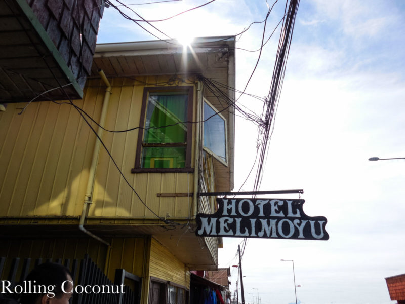 Chile Chiloe Quellon Hostel Quellon Outside Sign Rolling Coconut OOAworld Photo Ooaworld