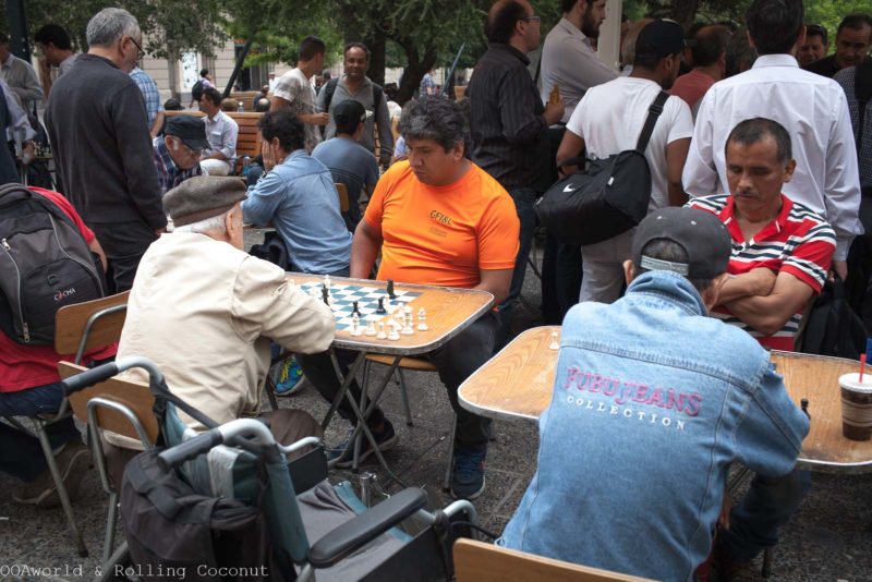 Santiago Plaza de Armas Chess Players OOAworld Rolling Coconut Travel