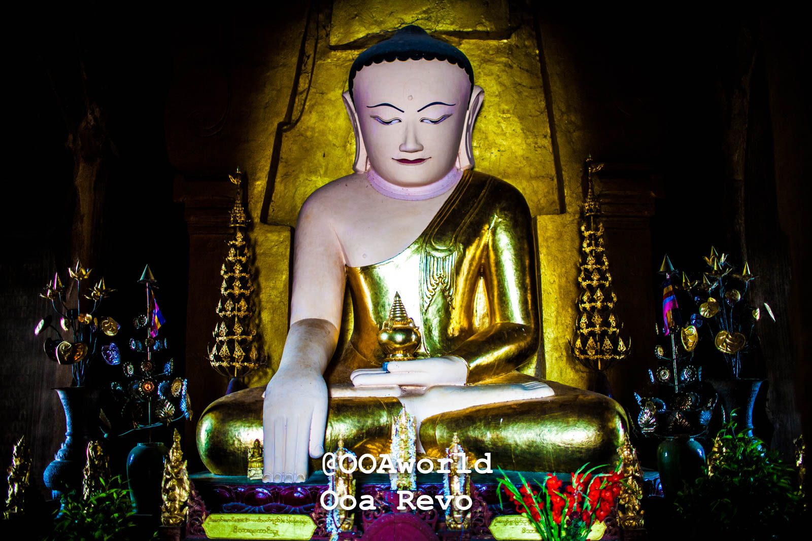 Bagan Landscapes Part I Bagan Golden Buddha statue in a dimly lit temple Photo OOAworld