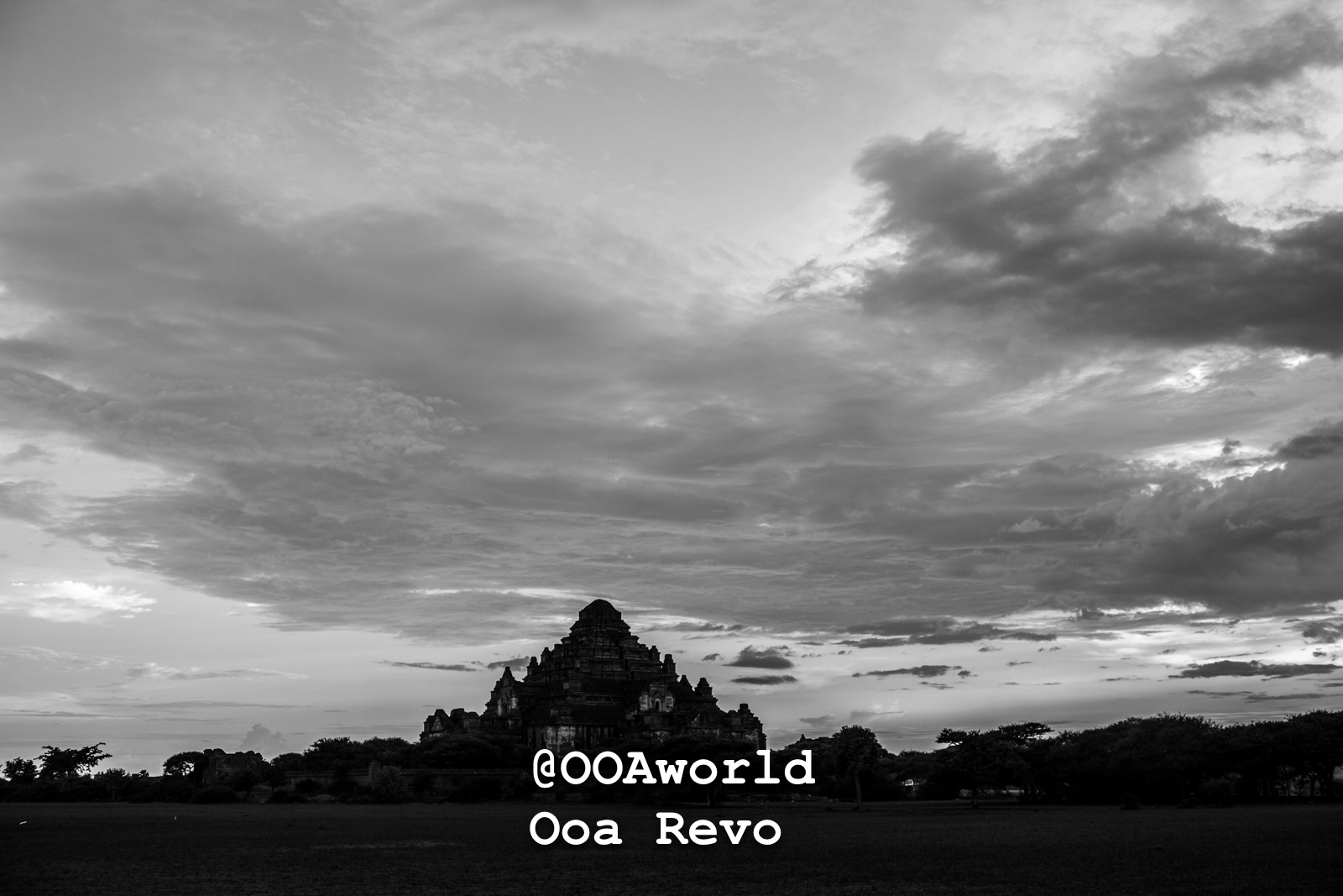 monochrome Bagan temple under dramatic cloudy sky Photo OOAworld