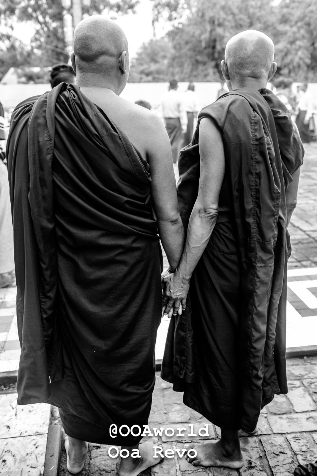 Bagan People Part I Bagan Two Buddhist monks holding hands in black and white Photo OOAworld