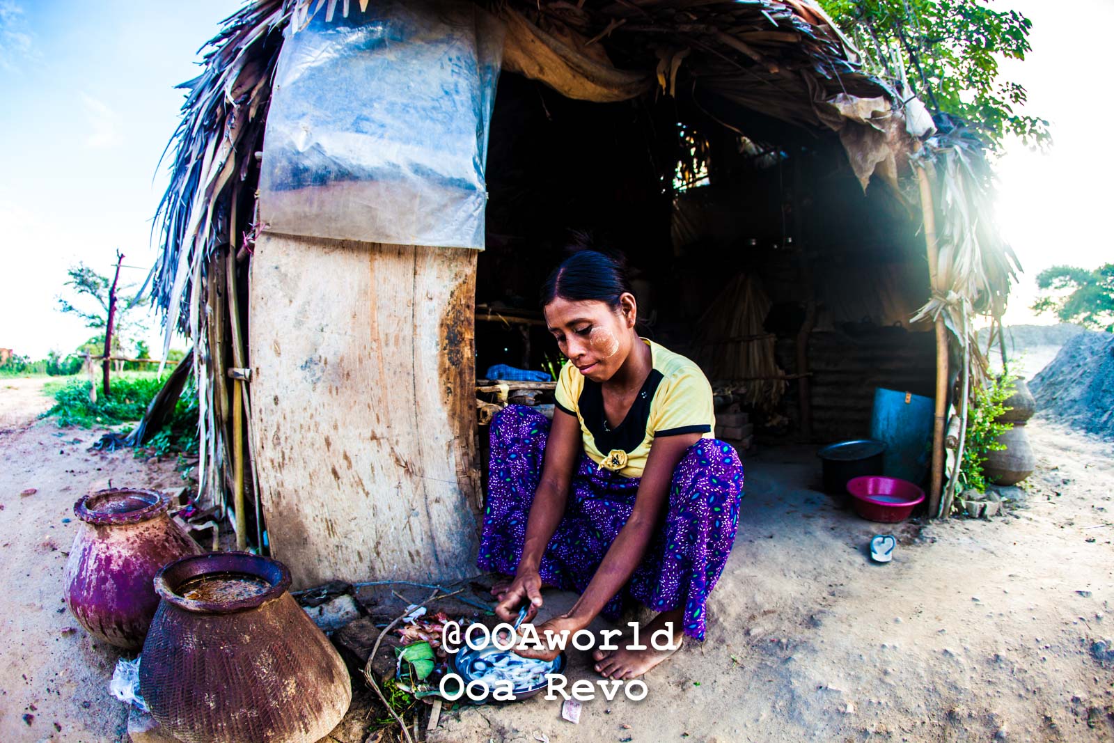 Bagan People Part II Bagan woman preparing food outside rural hut Photo OOAworld