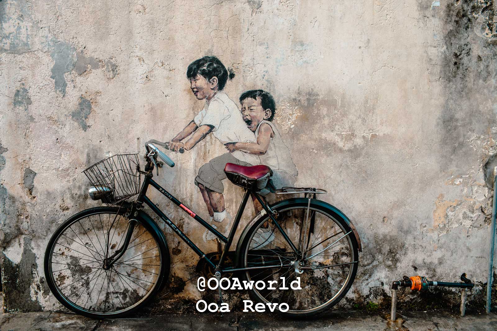 Georgetown Streets Georgetown Street art mural of children on a bicycle in Penang Photo OOAworld