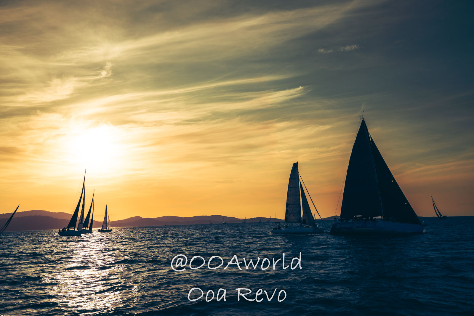 Airlie Beach Whitsundays Australia sailboats at sunset on the ocean Photo OOAworld