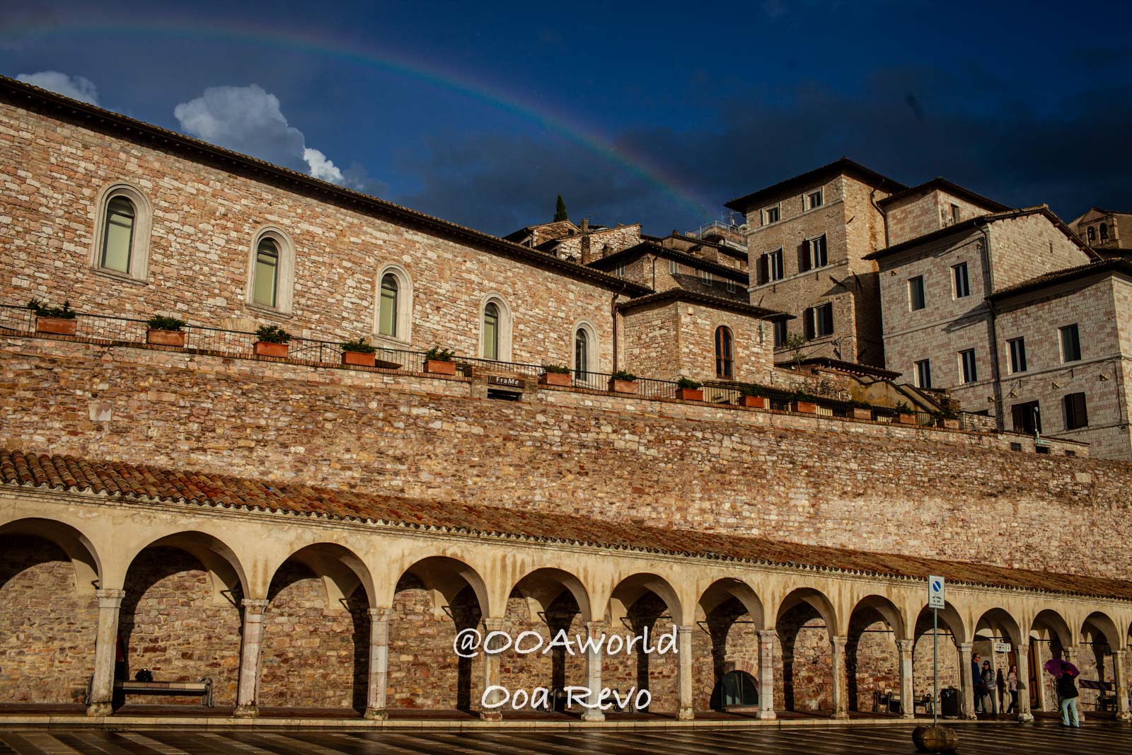 Assissi Italy Assisi stone buildings under a rainbow Photo OOAworld