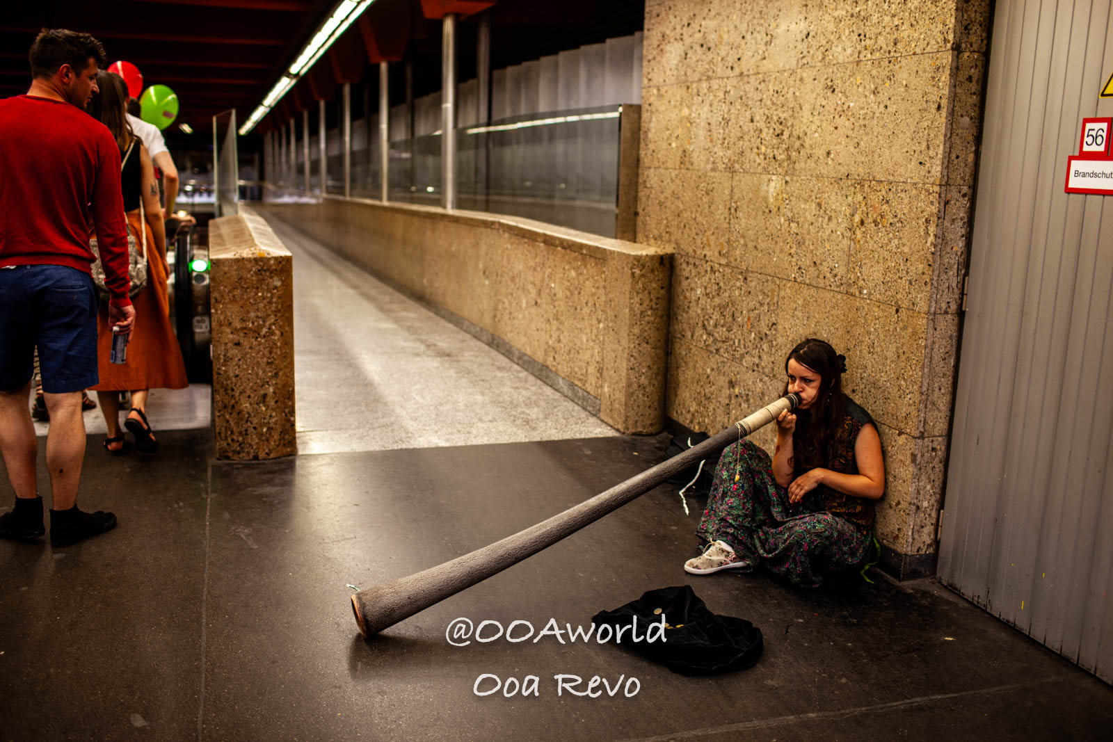 Vienna Austria street musician playing didgeridoo in subway station Photo OOAworld