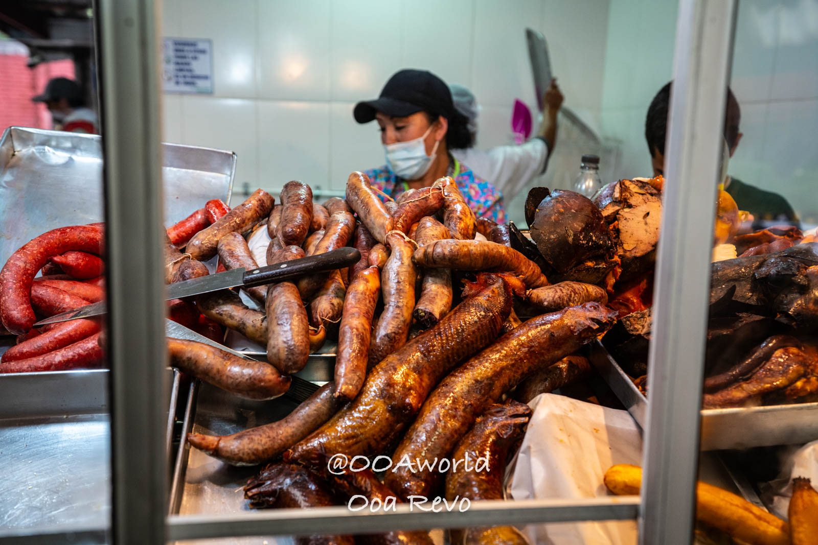 La Candelaria Bogota Assortment of sausages and meats at a market stall Photo OOAworld