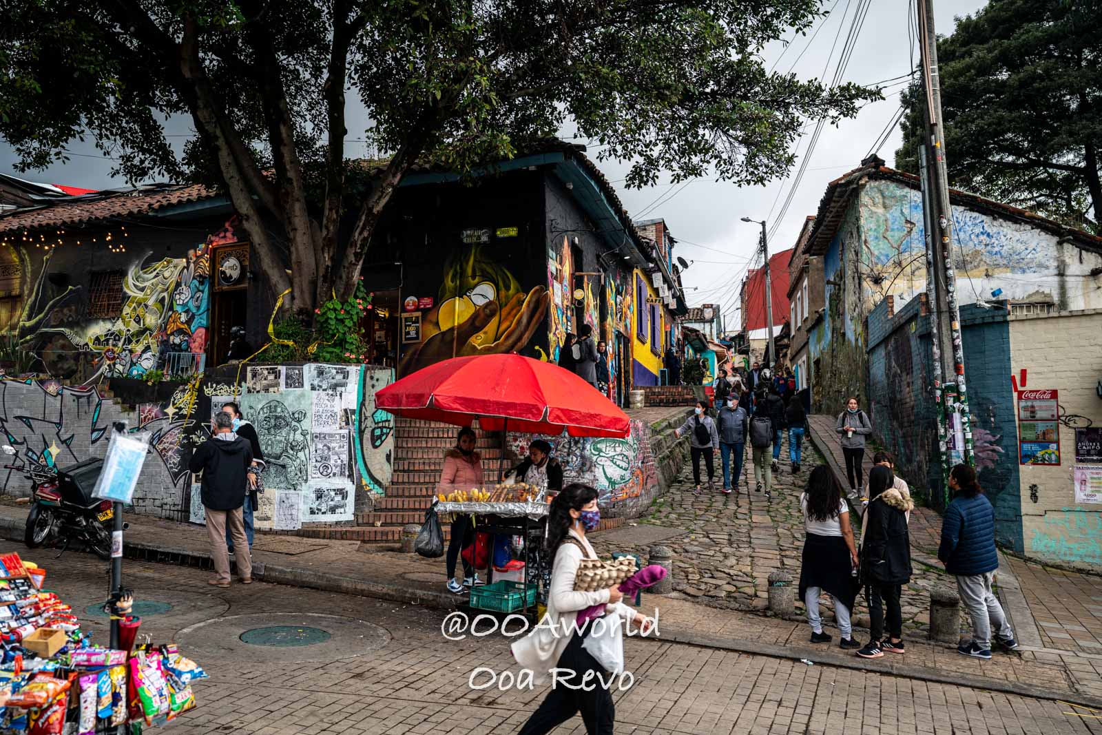 colorful street art and vendors in Bogota Colombia Photo OOAworld