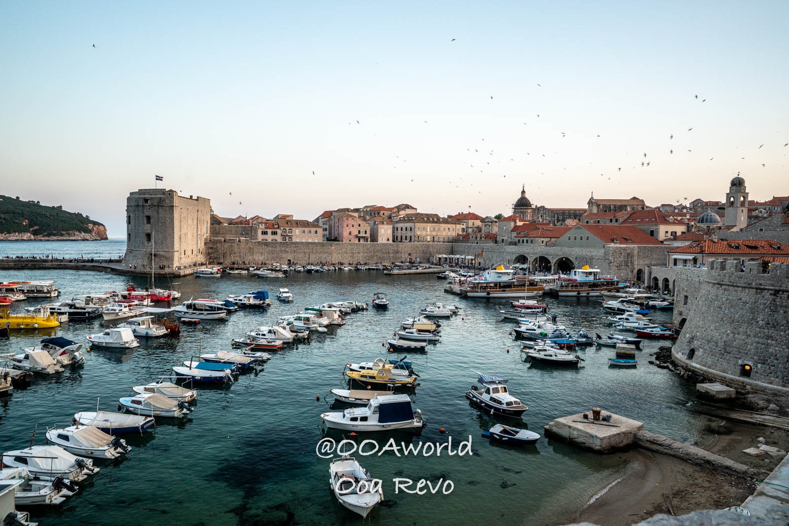 Dubrovnik Croatia Dubrovnik old town harbor boats sunset Photo OOAworld