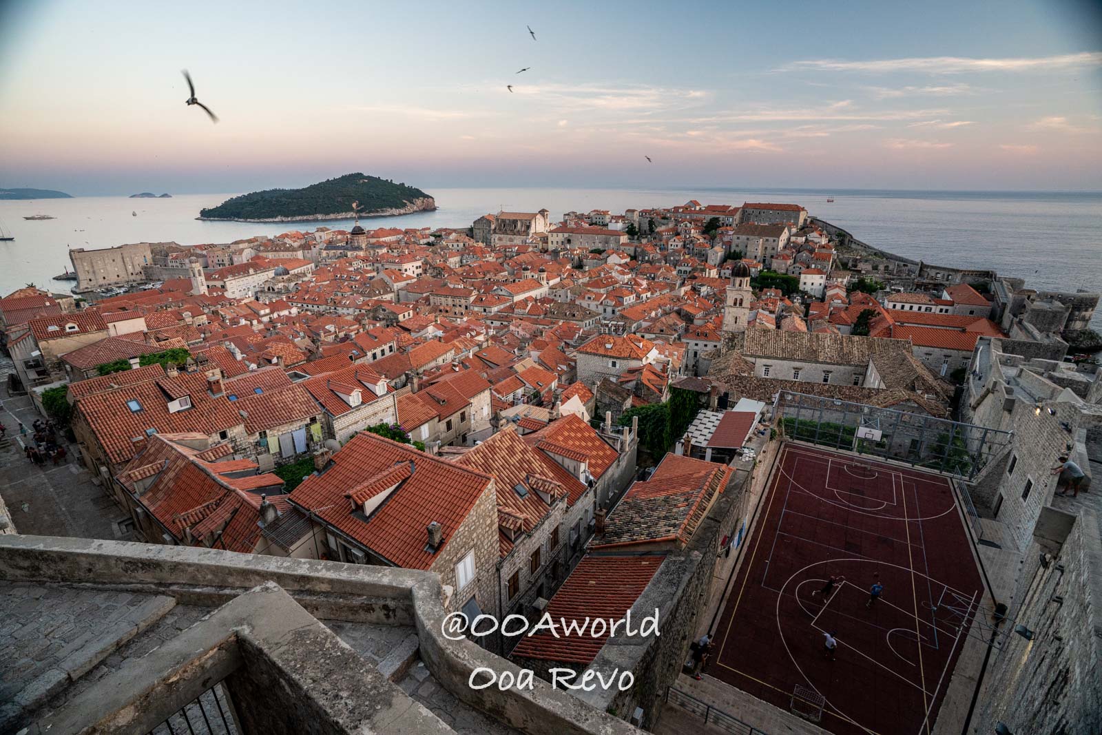 Dubrovnik Croatia Aerial view of Dubrovnik with red rooftops and sea Photo OOAworld