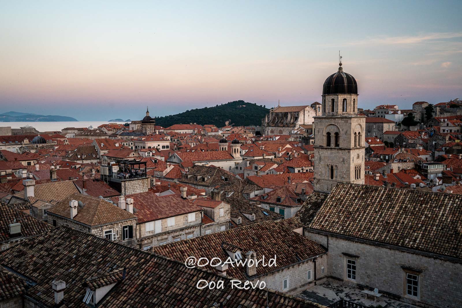 Dubrovnik Croatia sunset over Dubrovnik rooftops with church spire Photo OOAworld