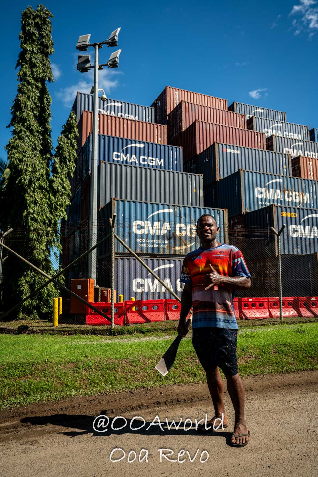 Nadi Suva Lautoka People Portraits Fiji man in front of shipping containers in tropical setting Photo OOAworld