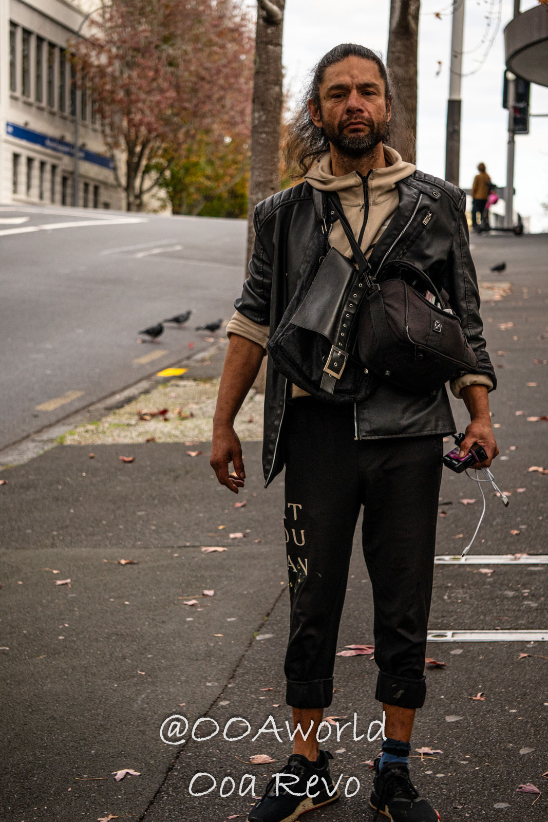Hobbiton, Coromandel, Auckland New Zealand street style man black leather jacket urban Photo OOAworld
