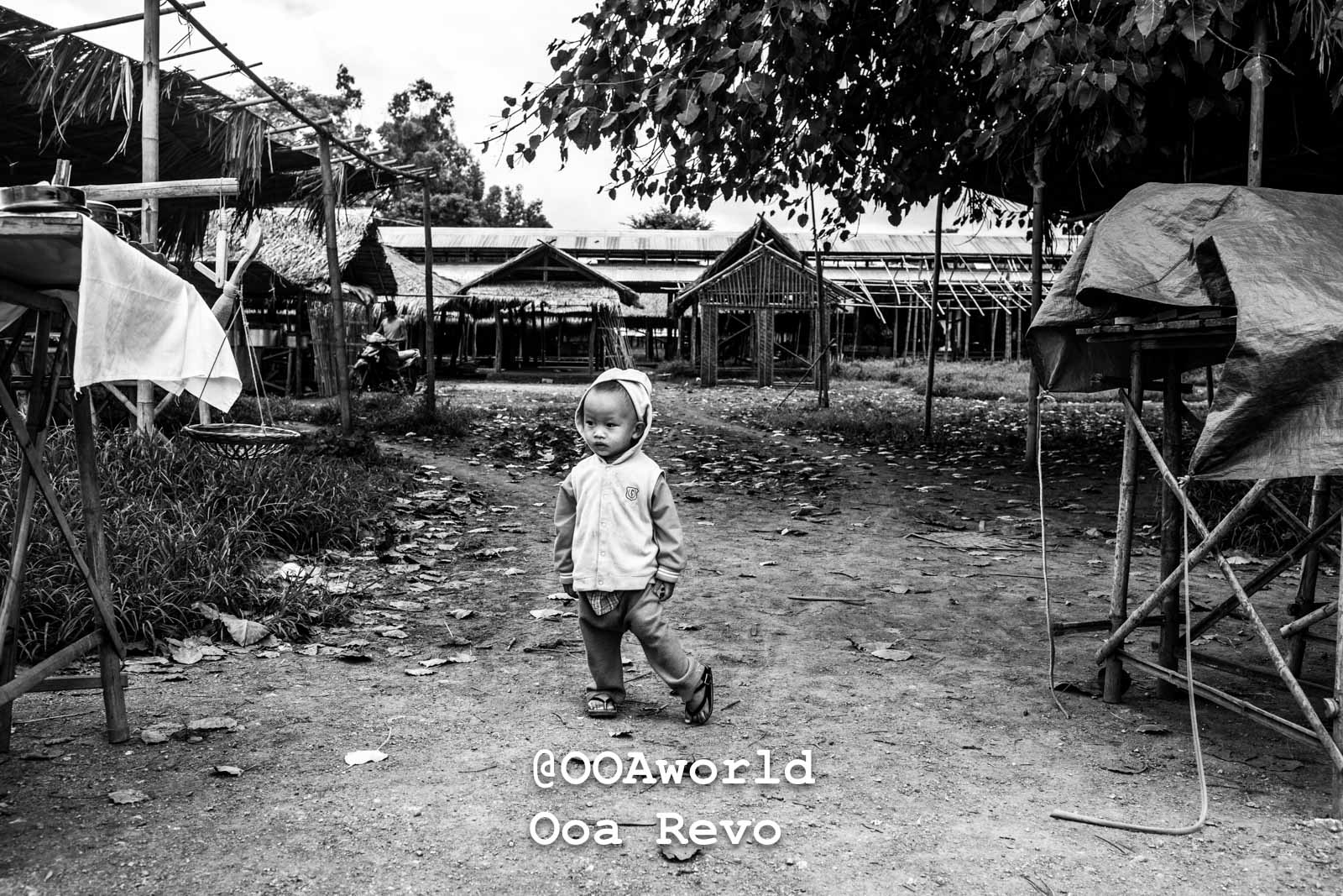 Inle Lake People Inle Lake black and white photo of child walking in rural village Photo OOAworld