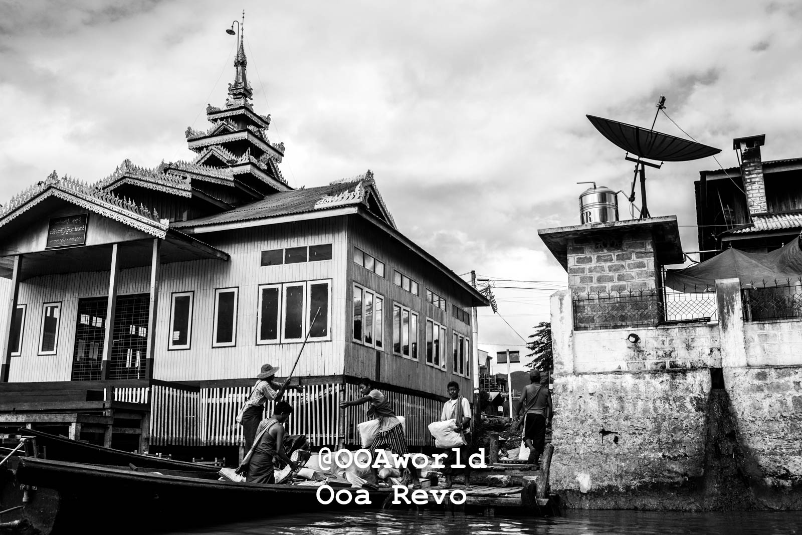 Inle Lake People Inle Lake traditional building and boat on water black and white Photo OOAworld