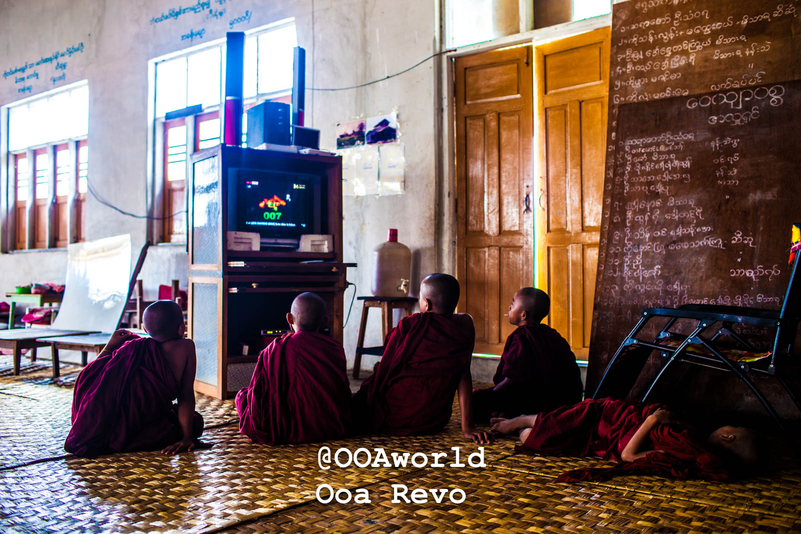 Inle Lake People Inle Lake young monks watching television in a monastery Photo OOAworld