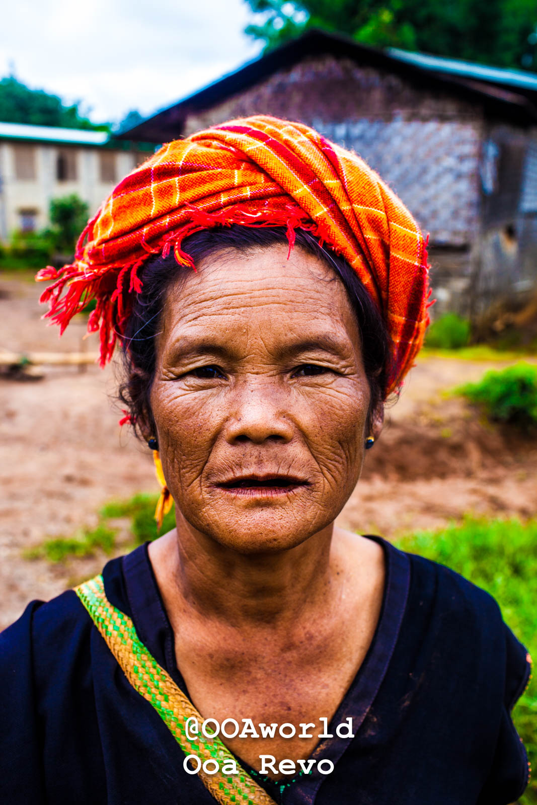 Kalaw Portraits Kalaw Htee Thein portrait of a woman in traditional attire with orange headscarf Photo OOAworld