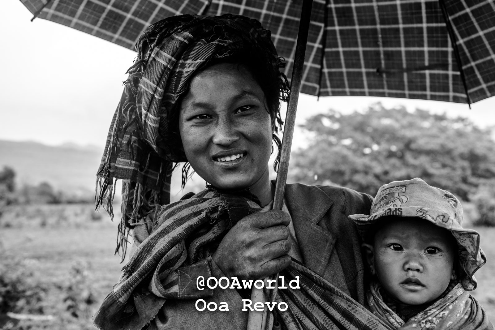 Kalaw Portraits Kalaw Htee Thein smiling mother with child under umbrella black and white Photo OOAworld