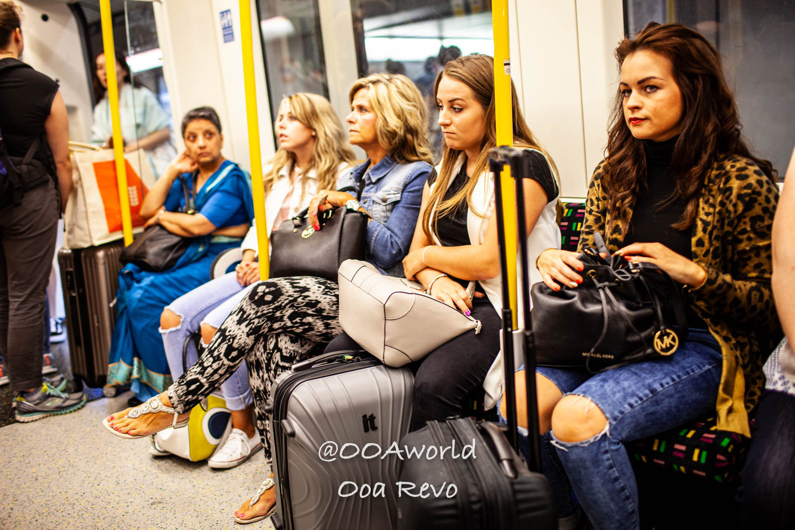 London People and Streets London commuters sitting on subway train Photo OOAworld