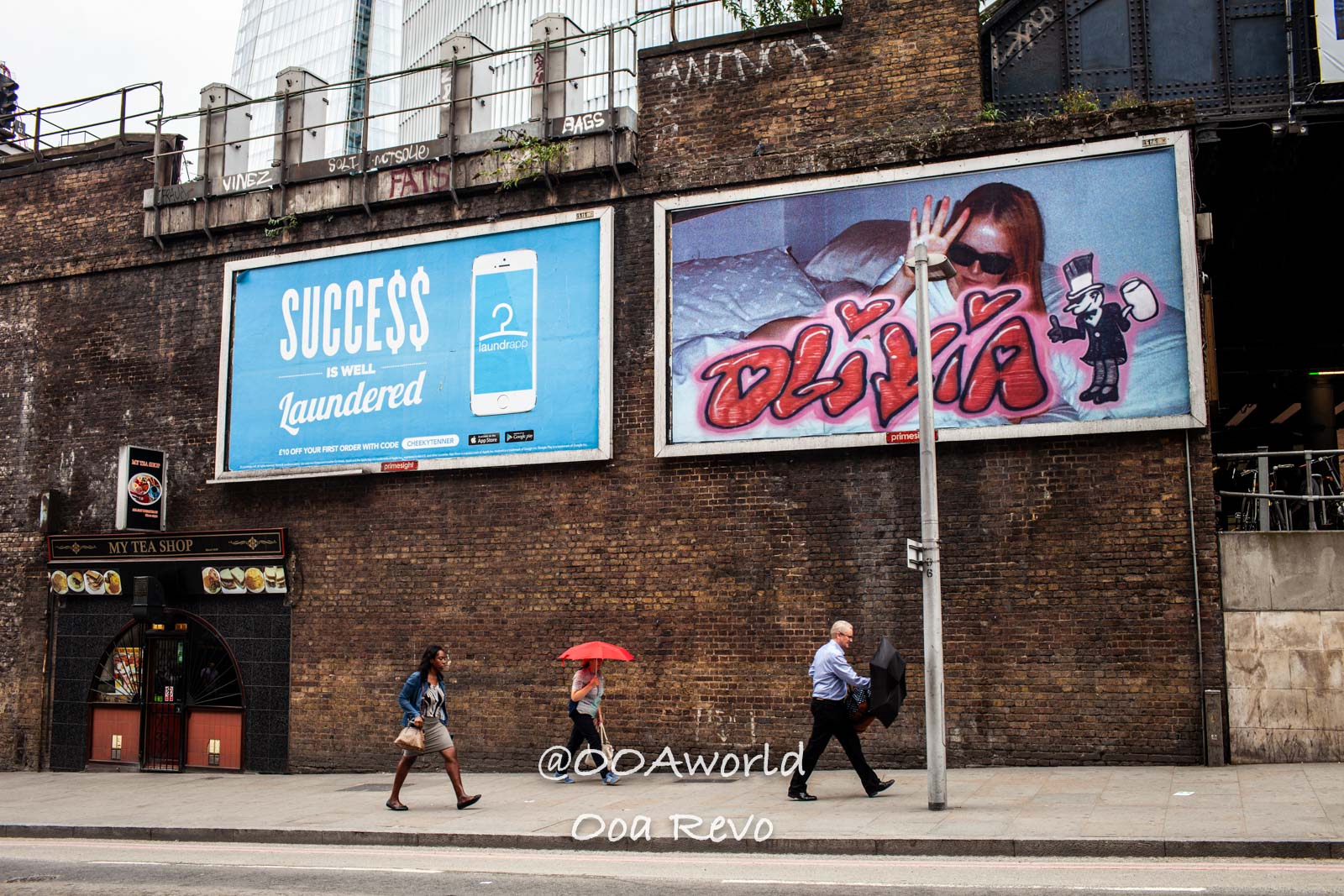 London People and Streets London urban street scene with billboards and pedestrians Photo OOAworld