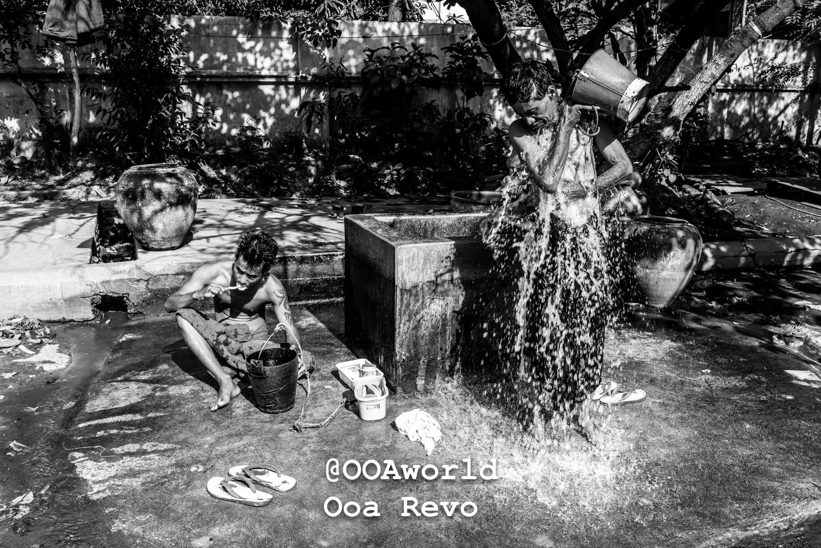 Mandalay People Mandalay two men bathing and brushing teeth in outdoor setting black and white Photo OOAworld