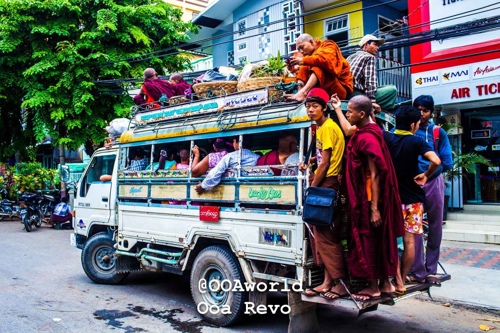 Mandalay People Mandalay crowded truck with monks and passengers in Myanmar Photo OOAworld