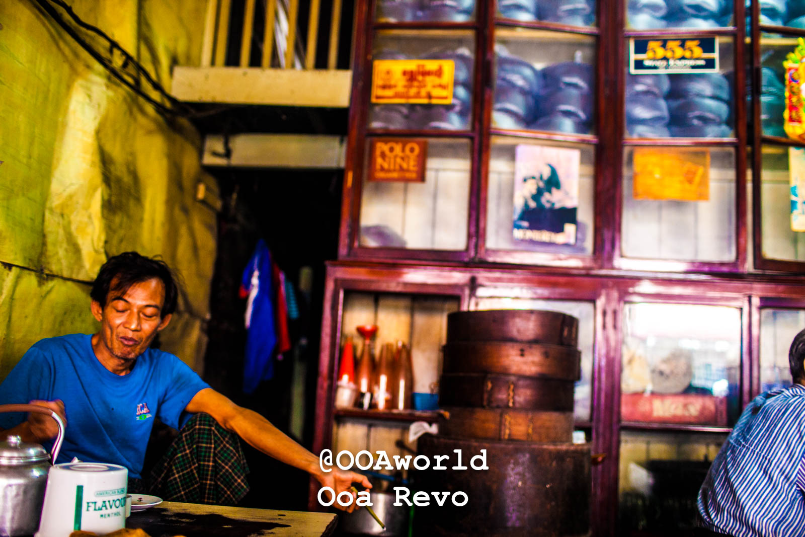 Mawlamyine Myanmar local bakery shop with man enjoying tea Photo OOAworld