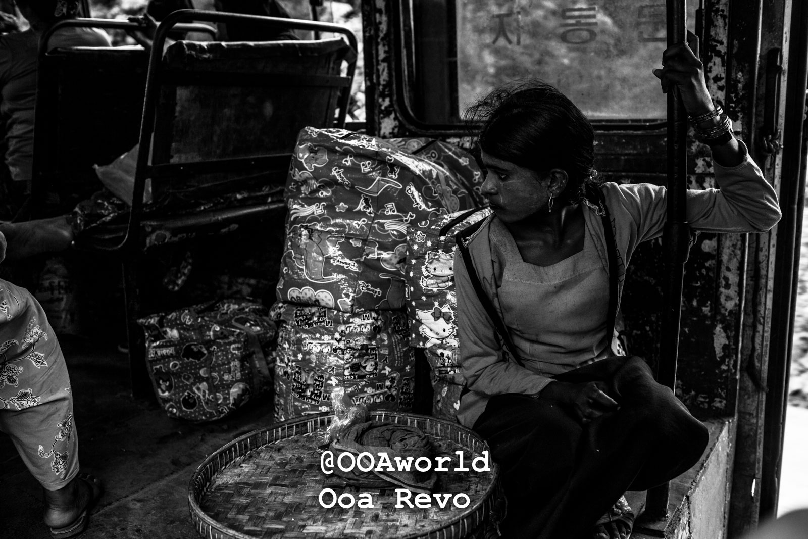 Mawlamyine Myanmar woman sitting on bus with bags black and white Photo OOAworld