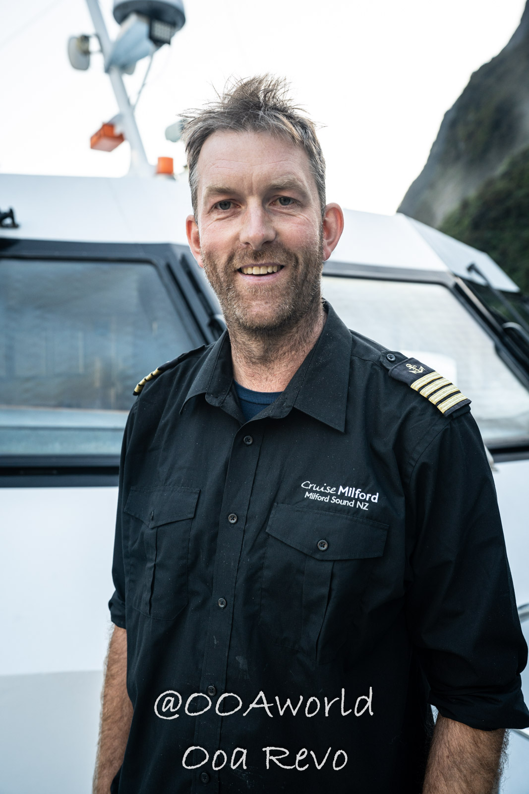 Boat captain Milford Sound New Zealand Photo OOAworld