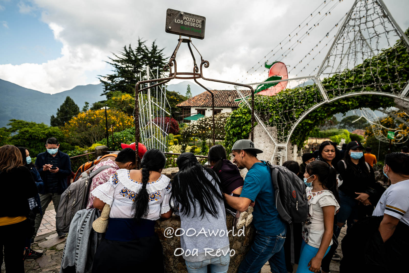 Monserrate Sanctuary Bogota Tourists at Wishing Well Photo OOAworld Monserrate Sanctuary Bogota Tourists at wishing well in scenic mountain setting Photo OOAworld