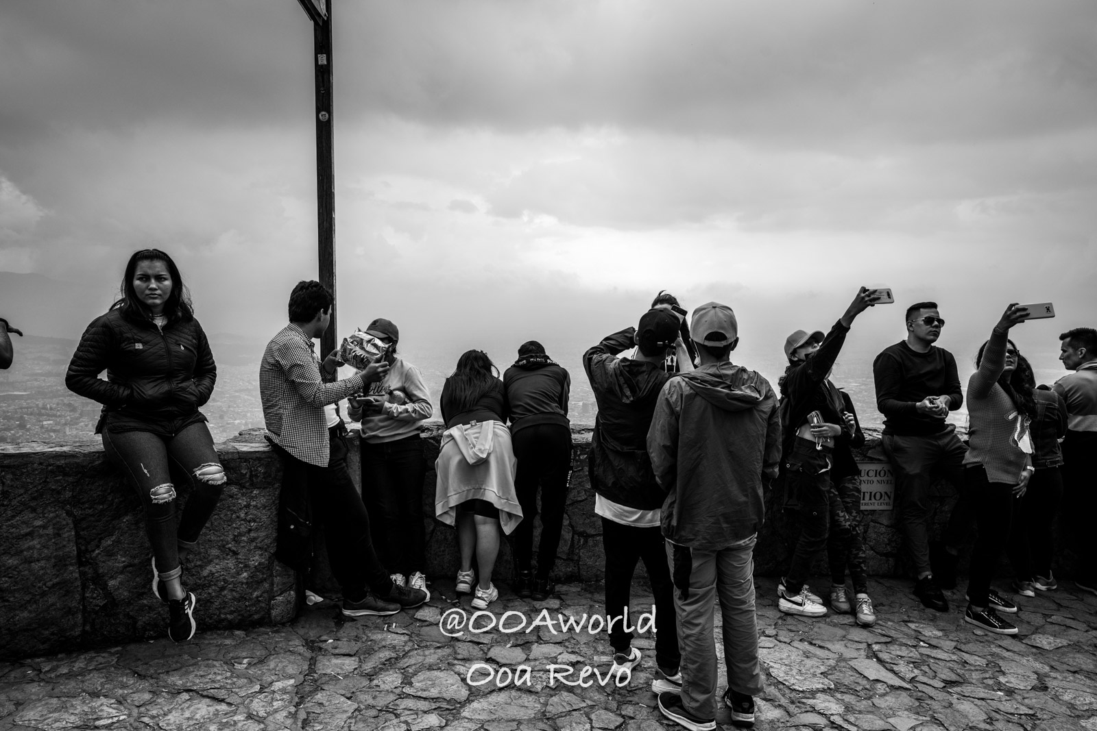 Monserrate Sanctuary Bogota tourists at scenic overlook in monochrome Photo OOAworld Monserrate Sanctuary Bogota tourists at scenic overlook in monochrome Photo OOAworld
