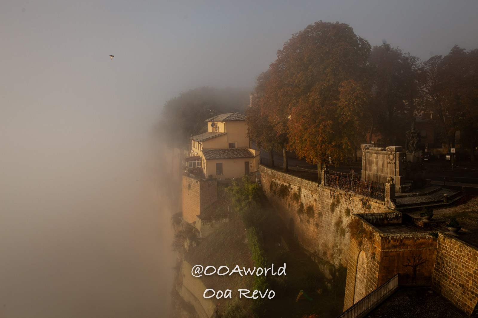 Orvieto Italy misty cliffside village with autumn trees Photo OOAworld Orvieto Italy misty cliffside village with autumn trees Photo OOAworld