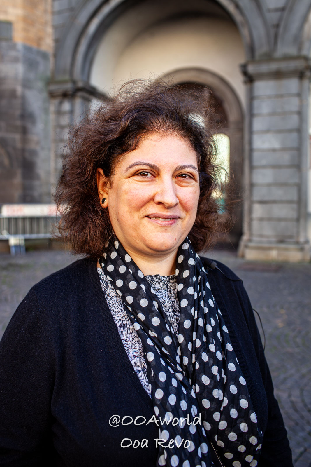 Orvieto Italy Woman with polka dot scarf outside Photo OOAworld Orvieto Italy smiling woman with curly hair and polka dot scarf outside Photo OOAworld