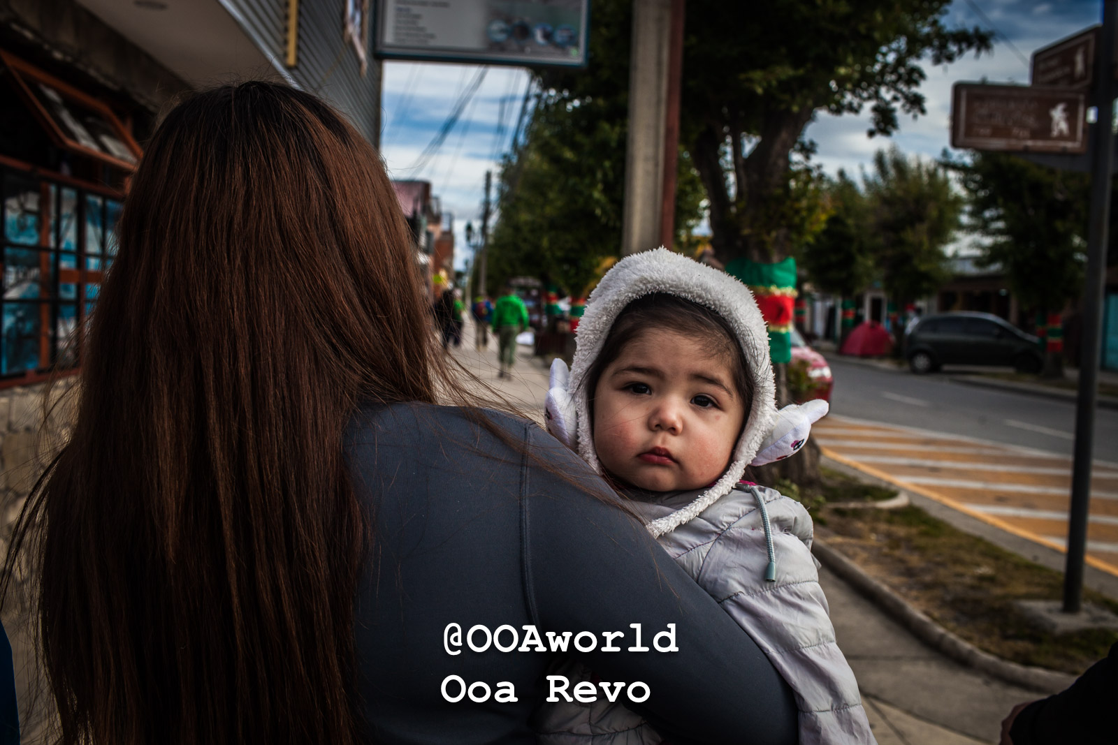 Puerto Natales Post Trek Torres Del Paine Trek child in cozy winter clothing Photo OOAworld