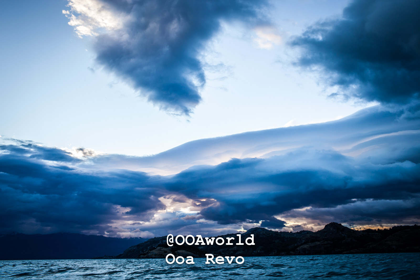 Puerto Rio Tranquilo People and Landscapes Puerto Rio Tranquilo OOAworld dramatic cloudscape over ocean at sunset Photo OOAworld