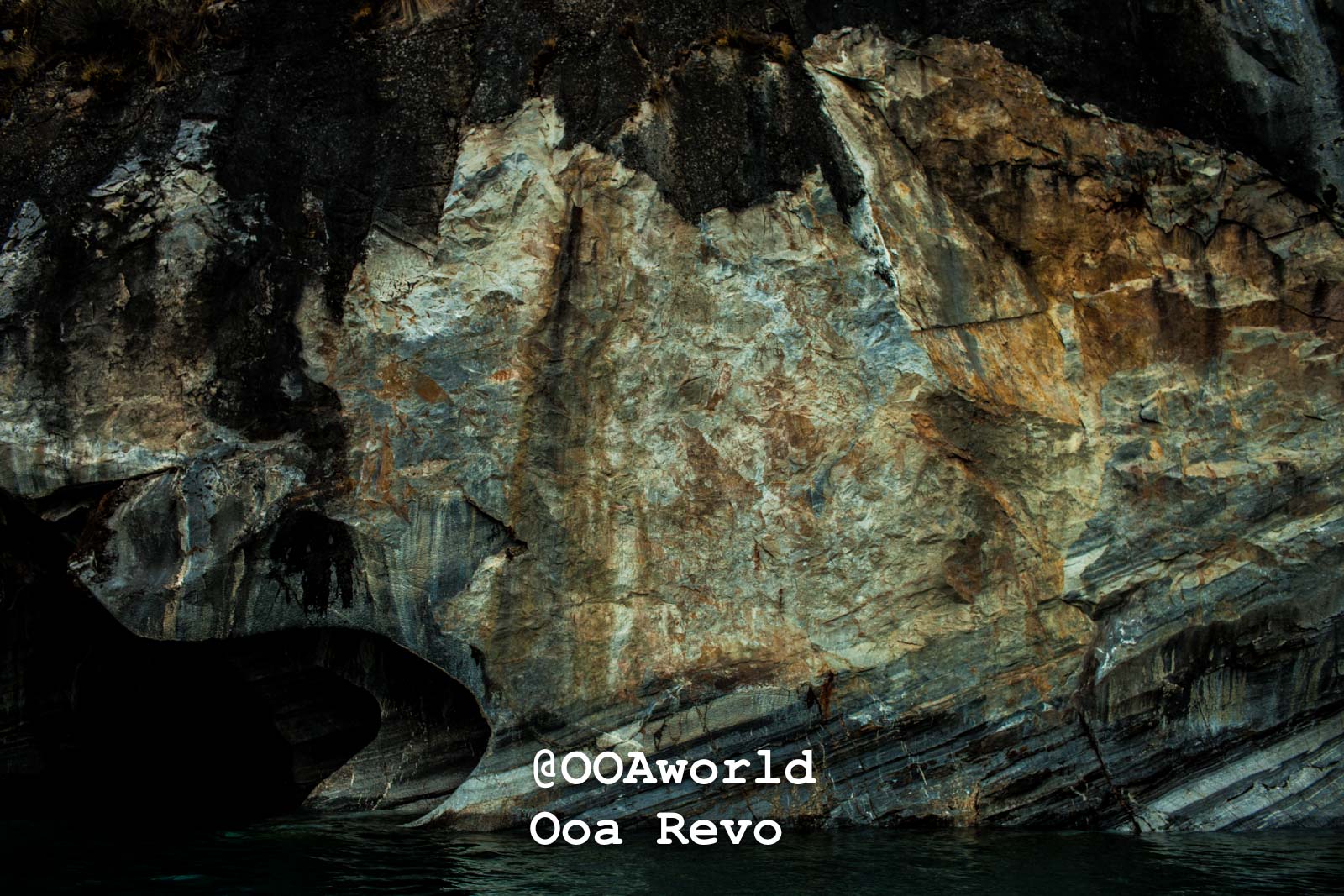 Puerto Rio Tranquilo Textures 1 Puerto Rio Tranquilo OOAworld rocky cliff texture with dark shadows by water Photo OOAworld