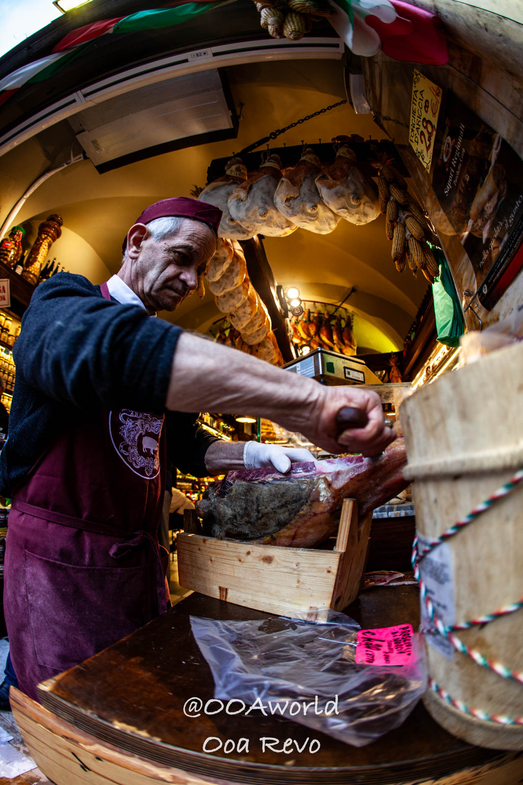 Rome Street Photography Rome Butcher slicing cured meat in Italian deli Photo OOAworld