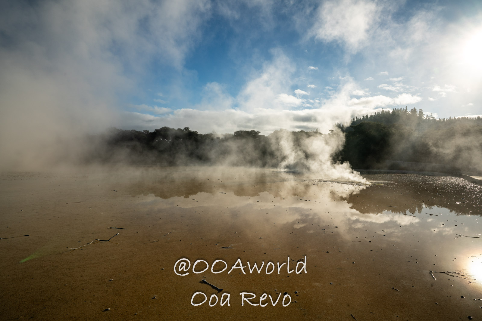 Rotorua Redwoods, Waitopu Thermal Wonderland New Zealand Geothermal hot spring with steam rising against blue sky Photo OOAworld