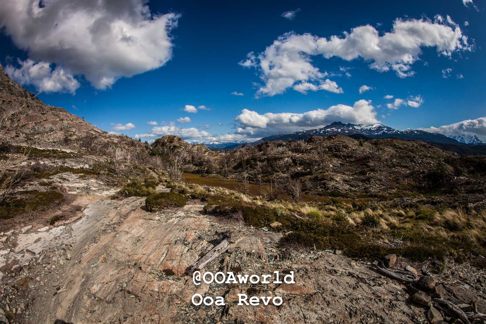 Torres Del Paine Day 1 Torres Del Paine Trek Patagonia rugged landscape blue sky mountains Photo OOAworld