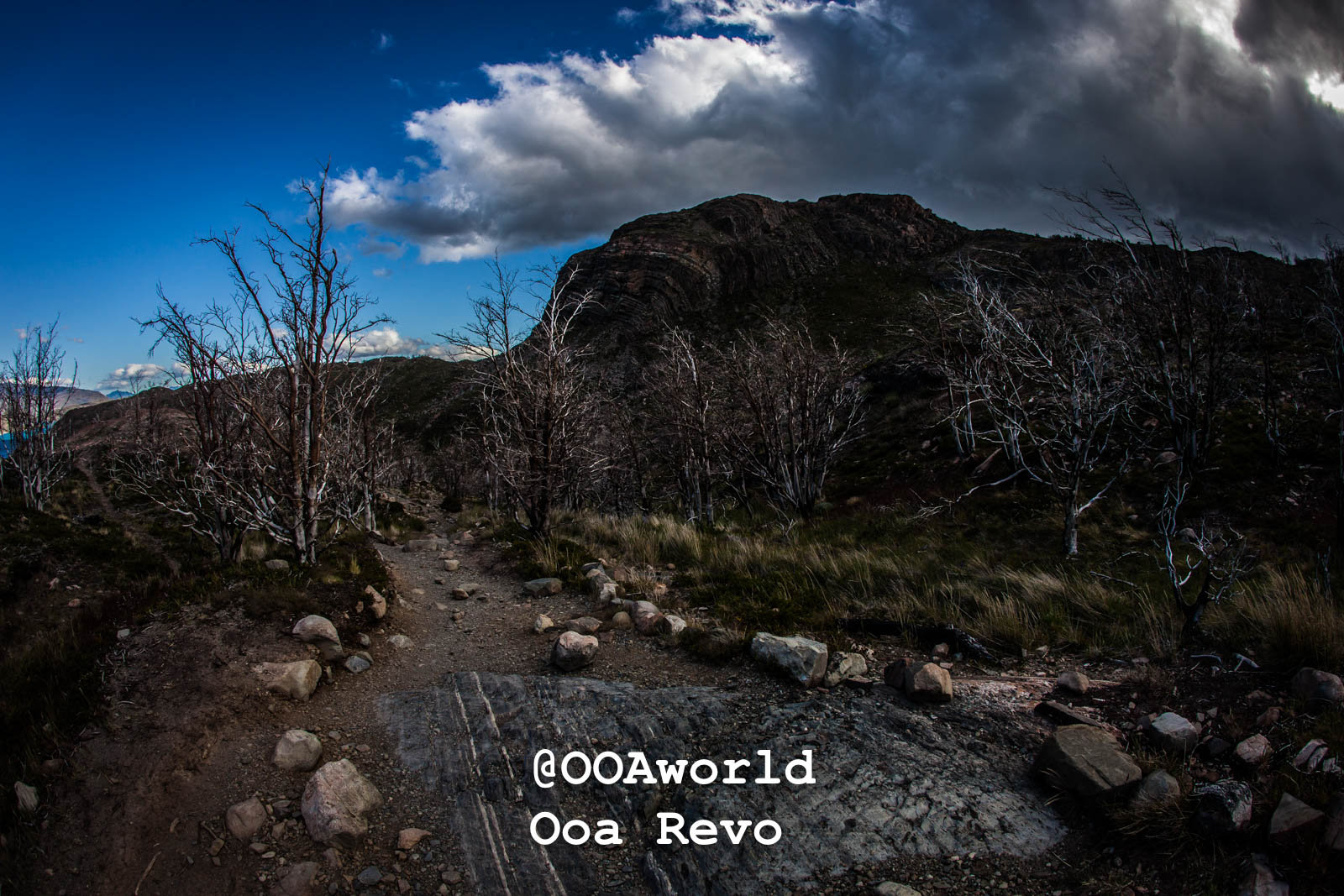 Torres Del Paine Day 1 Torres Del Paine Trek Rocky mountain path under cloudy sky Photo OOAworld
