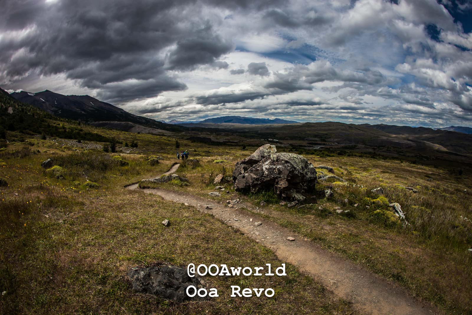 Torres Del Paine Day 3 Torres Del Paine Trek dramatic clouds over mountainous landscape hiking path Photo OOAworld