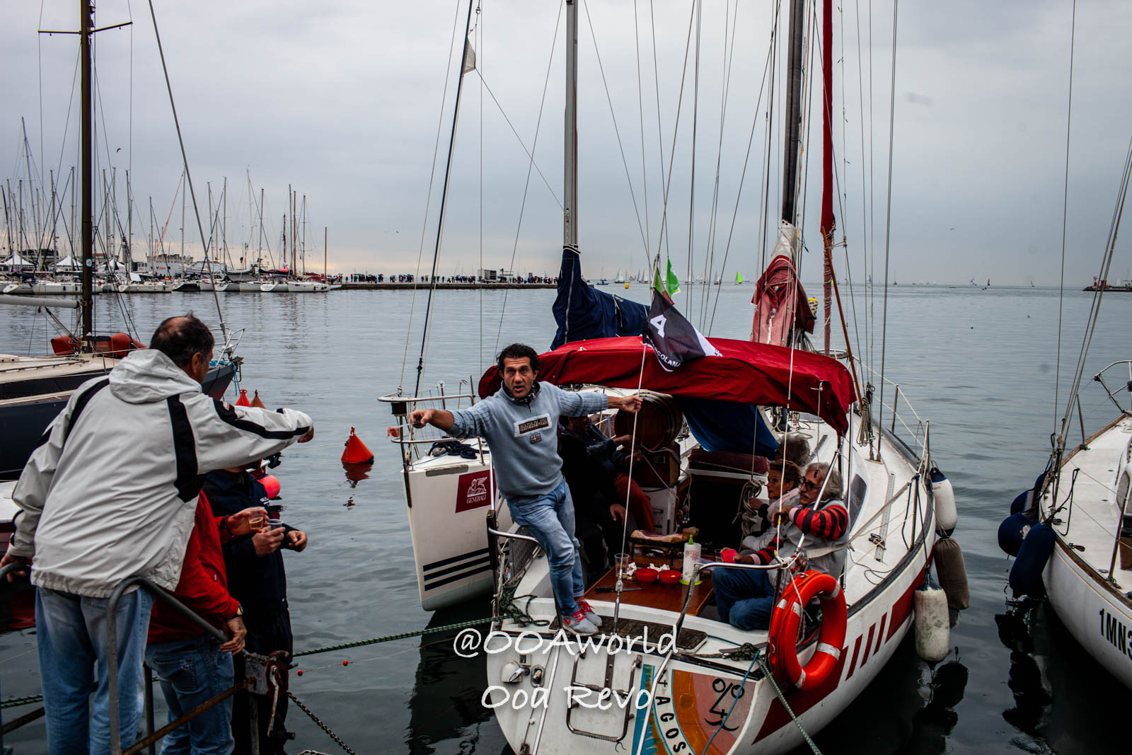 Trieste Italy sailboat crew at marina Photo OOAworld