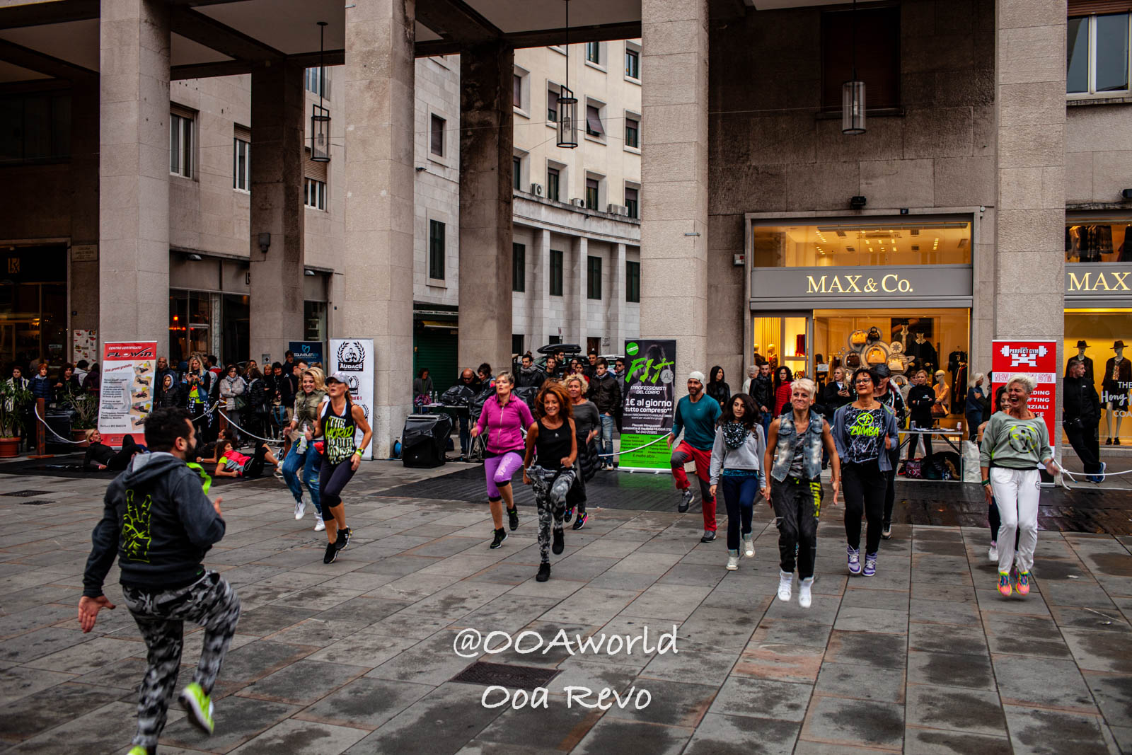 Trieste Italy outdoor fitness class in urban plaza Photo OOAworld