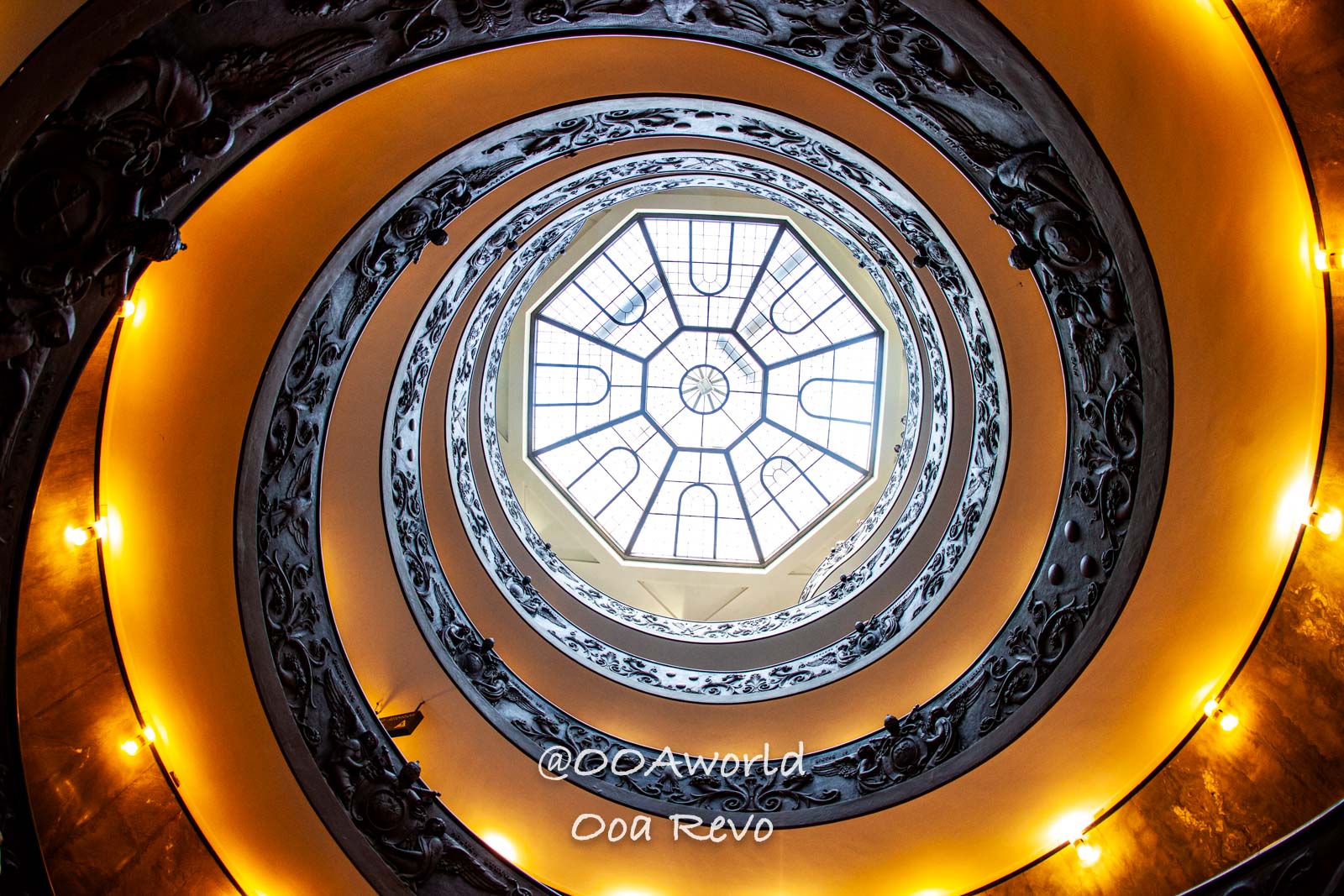 Vatican Italy spiral staircase with ornate railing and skylight view Photo OOAworld